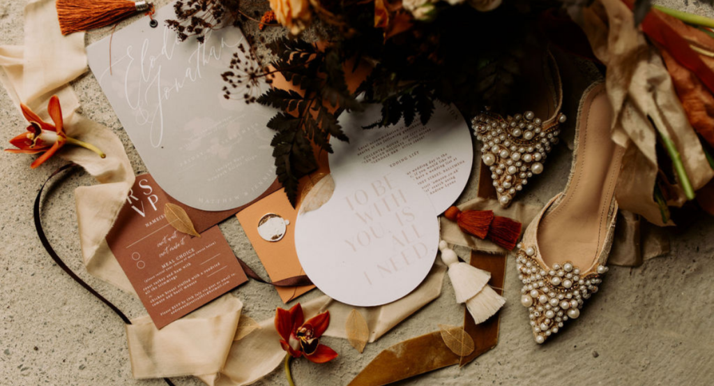 stunning flatlay with wedding stationary and wedding details 